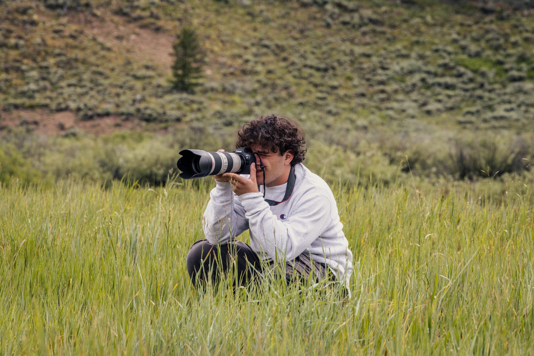 Albert Manes photographing on location