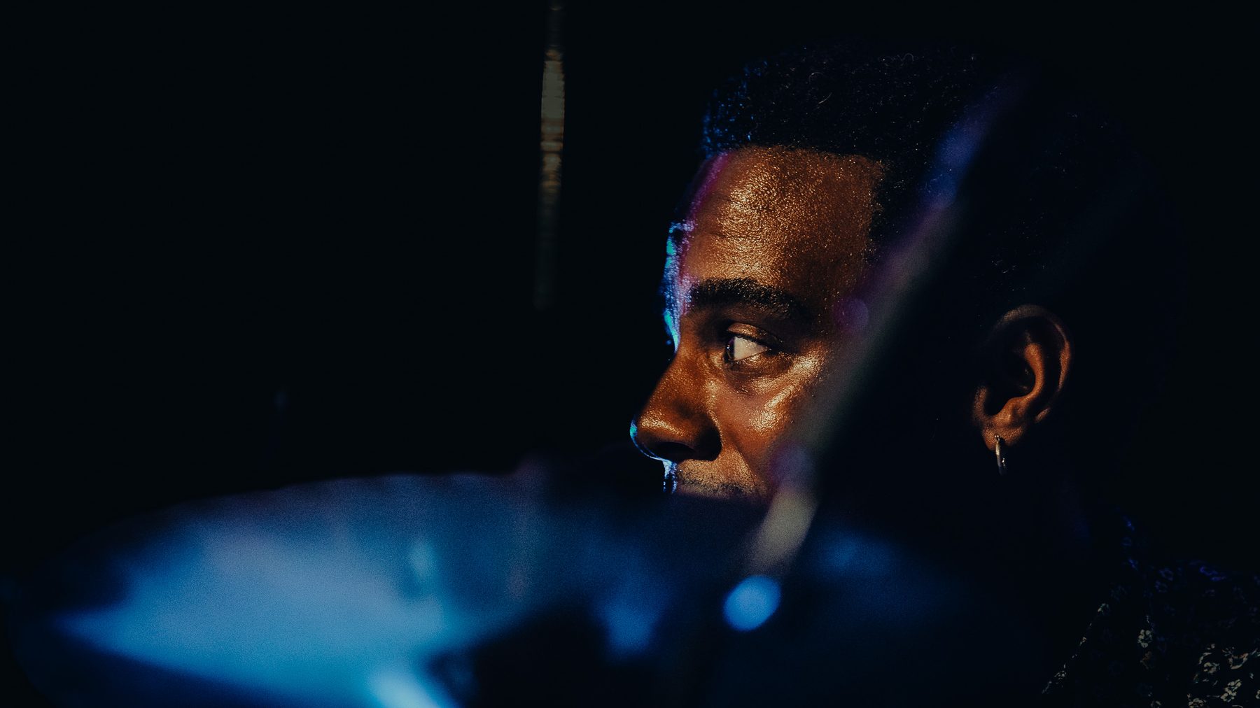Clarinetist in a hard spotlight